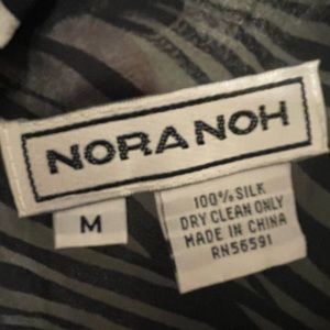 Zebra is back! Sleeveless and so nice on hot summer days or even under a jacket